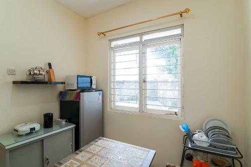 Hotel Kost Carmelia Syariah Baranangsiang Bogor