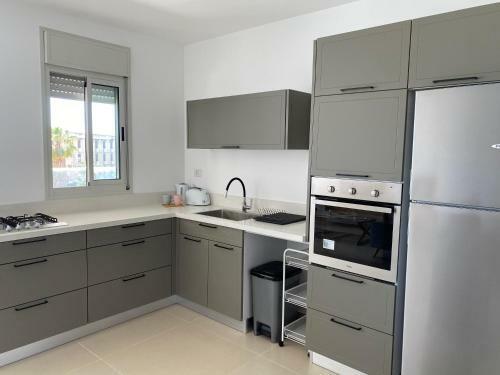 Acre New 3 Bedrooms Beachfront Apartment
