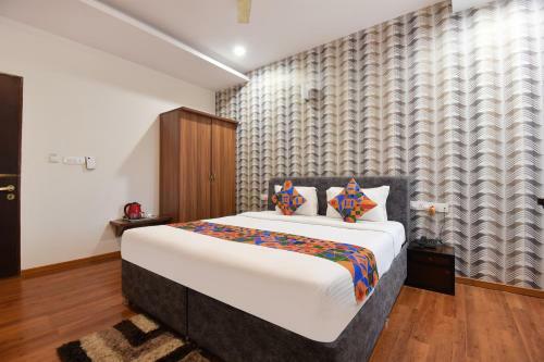 Fabhotel Dhanvitha Suites