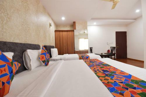 Fabhotel Dhanvitha Suites