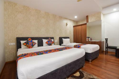 Fabhotel Dhanvitha Suites