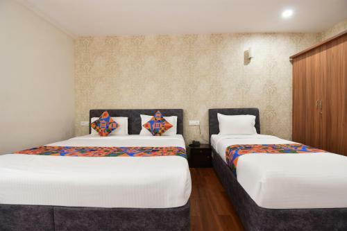 Fabhotel Dhanvitha Suites