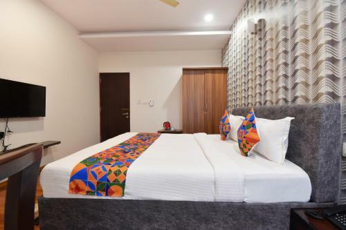 Fabhotel Dhanvitha Suites