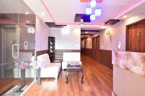 Fabhotel Dhanvitha Suites