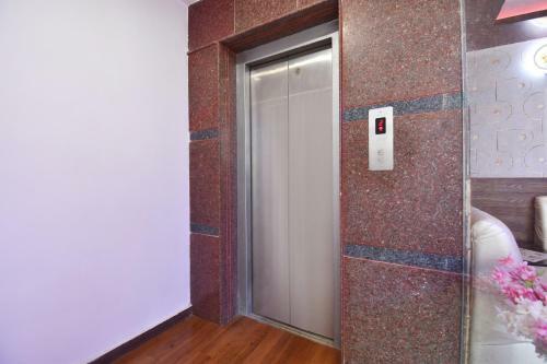 Fabhotel Dhanvitha Suites