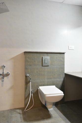 Fabhotel Dhanvitha Suites