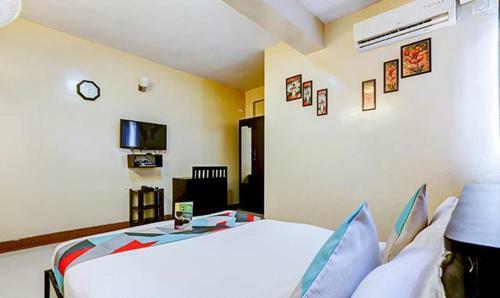 Hotel Palm Rooms Near St Johns Hospital