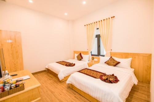 Hotel Kh�ch S?n Minh Nh?t T�n