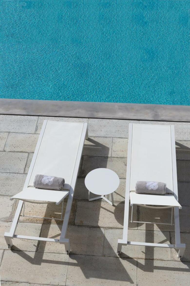 Ozadi Tavira Hotel