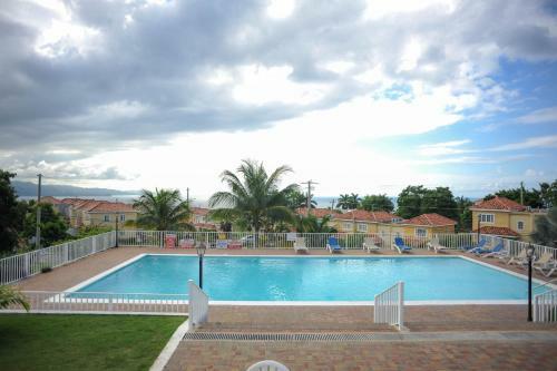 Hostal Holidays At Mango Walk Country Club