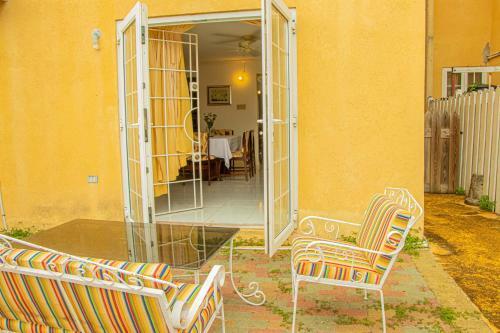 Hostal Holidays At Mango Walk Country Club