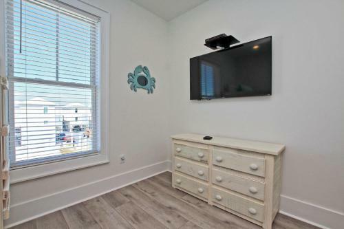 West Side Cottages Unit B By Youngs Suncoast