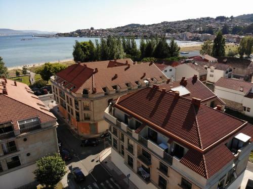 Apartamento �tico En Moa�a- A Xunqueira