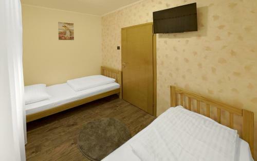 Hostal ?ad Apartments And Rooms