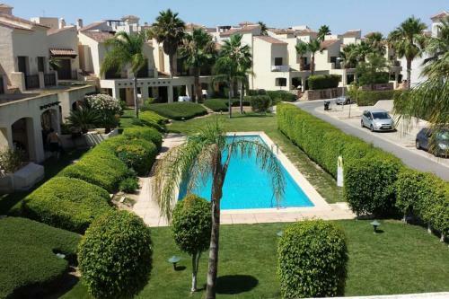 Roda Golf & Beach Resort. Townhouse, Poolside