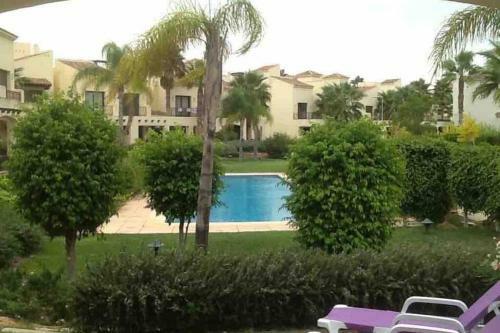 Roda Golf & Beach Resort. Townhouse, Poolside