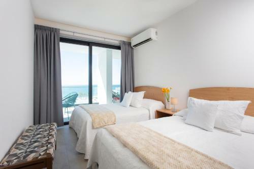 Blue View Beauty! Beachfront Condo With Large Private Terrace