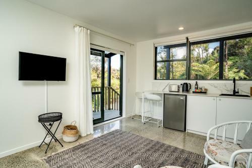 Apartamento Tui & Nikau Cabins