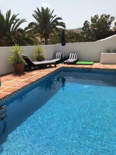 Casa Grande / Rosas Cantares