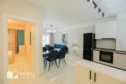 Miku Apartment - Vibrant 1bd Apartment At Olympic Residence