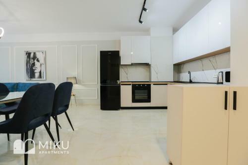 Miku Apartment - Vibrant 1bd Apartment At Olympic Residence