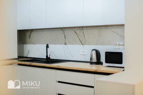 Miku Apartment - Vibrant 1bd Apartment At Olympic Residence