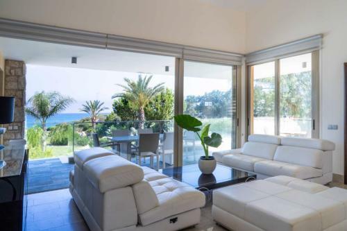 Villa Harmonia - 4 Bedroom Luxury Beach Front Villa With Private Swimming Pool