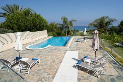 Villa Harmonia - 4 Bedroom Luxury Beach Front Villa With Private Swimming Pool