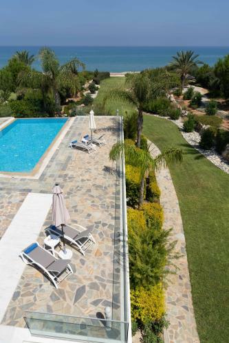 Villa Harmonia - 4 Bedroom Luxury Beach Front Villa With Private Swimming Pool