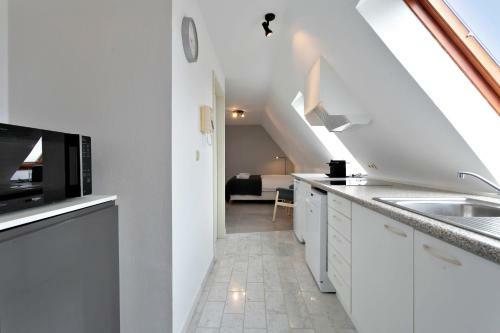 Apartamento Warm Lofty And Spacious Studio