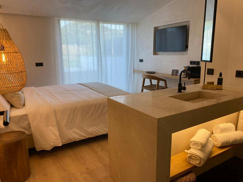 Hotel S Estancia Suites