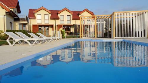 Koralia Domki I Apartamenty