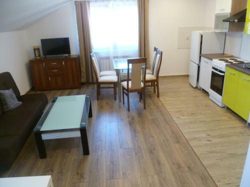 Klimatyczny Domek - Apartamenty & Noclegi