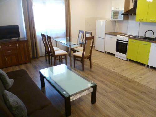 Klimatyczny Domek - Apartamenty & Noclegi