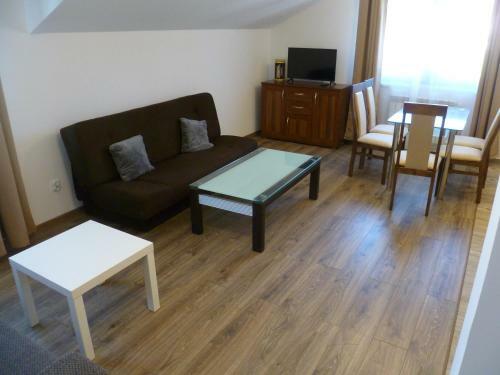 Klimatyczny Domek - Apartamenty & Noclegi