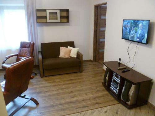 Klimatyczny Domek - Apartamenty & Noclegi