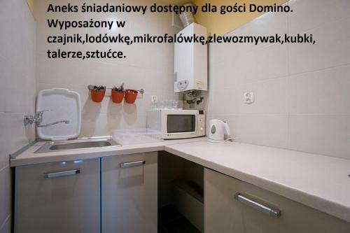 Domino - Pokoje I Apartamenty