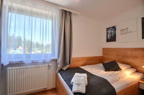 Apartamenty G??bce 75