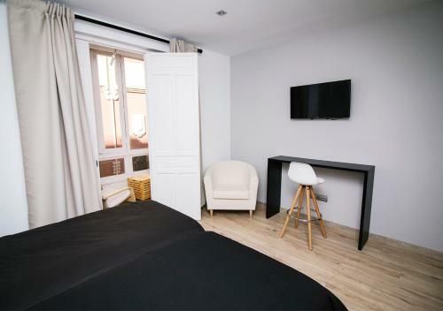 Hostal Infinium Zamora Suites