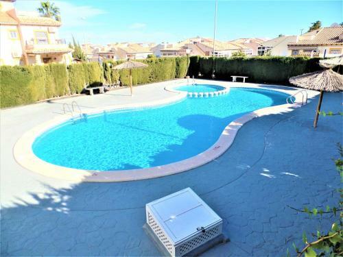 Ground Floor Apartment With Communal Pool Close To All Amenities