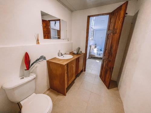 Hostal El Gato Rojas Surf Hostel