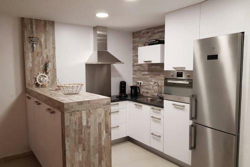 New! Modern Apartment Right On The Beach!