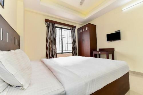 Hostal Oyo 79531 Metro Kochi