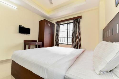 Hostal Oyo 79531 Metro Kochi