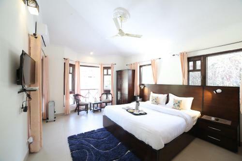 Saffronstays Ghughuti Ku Baasa