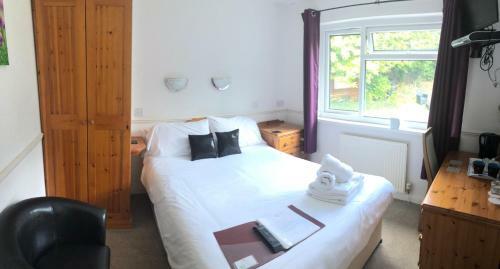Hostal Cottage Court Hotel