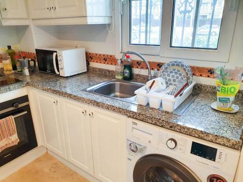 Spacious Ground Floor Apartment With Garden & Communal Pool