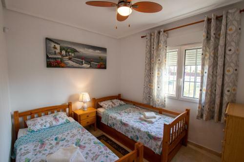 Spacious Ground Floor Apartment With Garden & Communal Pool