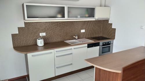 Belv�rosi T�th Apartman