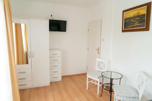 Hostal K�k Hull�m Vend�gh�z